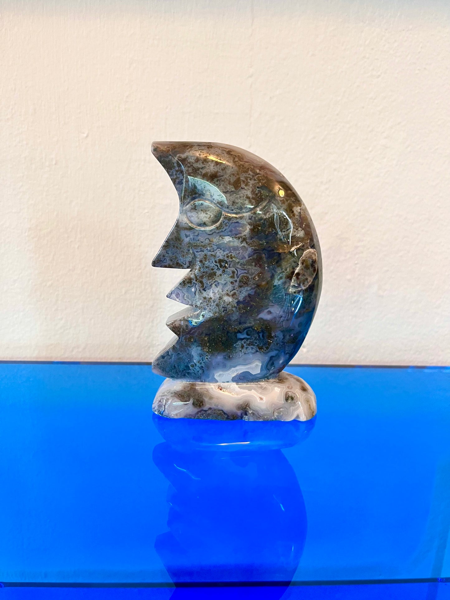 Moss agate moon carving